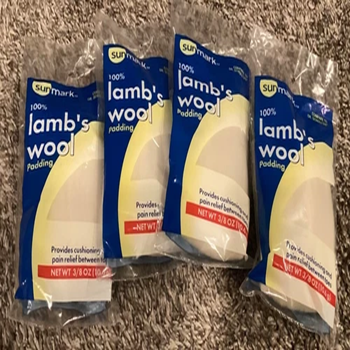 4 packs of lamb's wool padding Sunmark 3/8 oz (10.6 g)