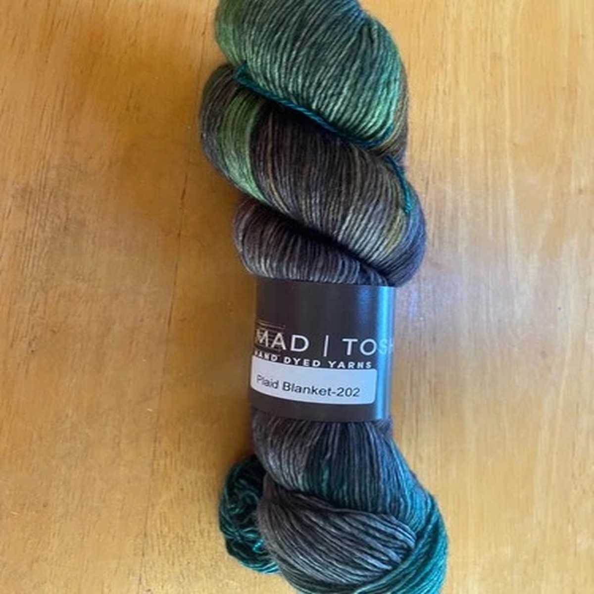 ModTosh hand dyed yarn, fingering wt. "Plaid Blanket" color, 420 yds.