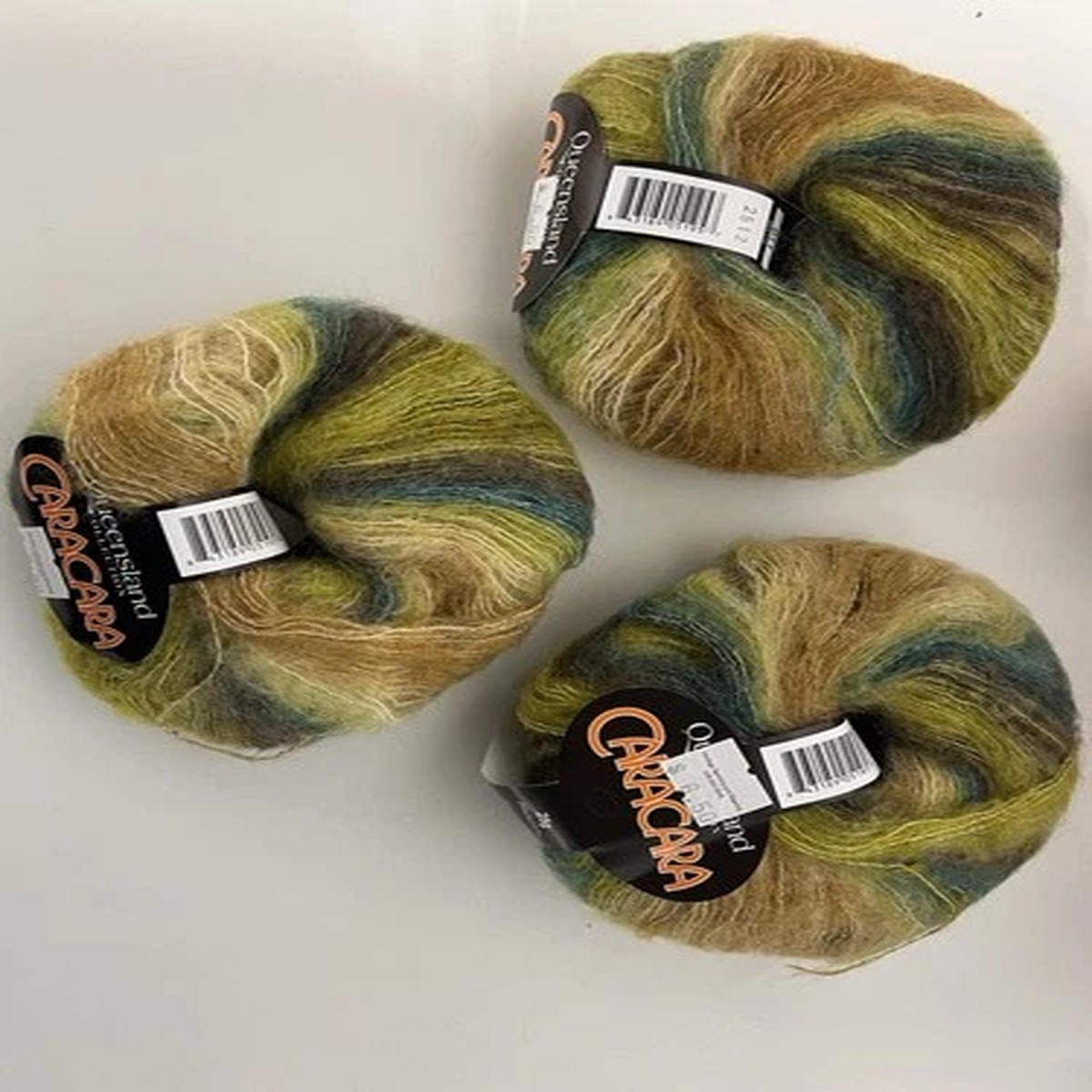 lot 3 skeins Queensland Caracara golds, greens