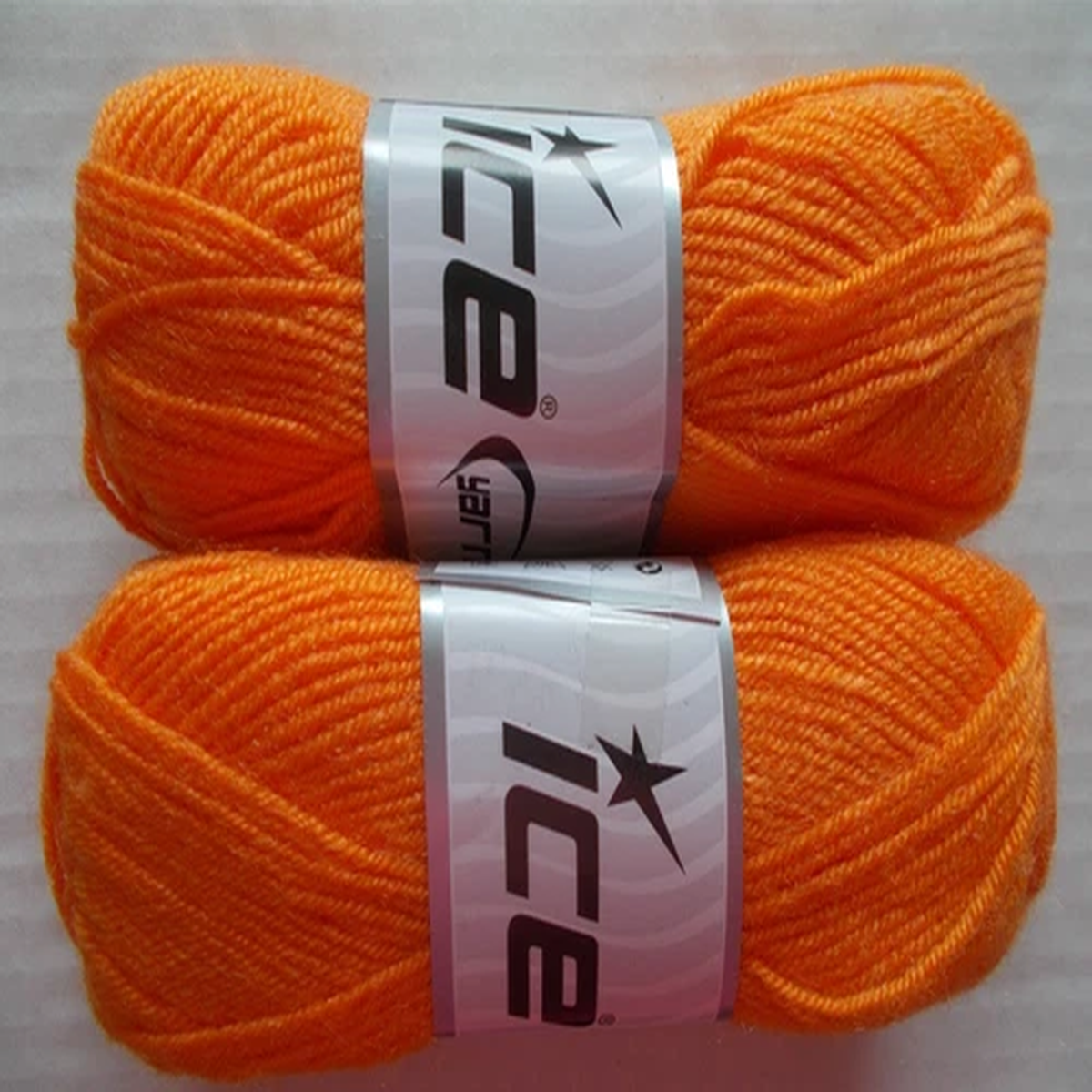 Ice Yarns baby Wool yarn, light orange lot of 2 (165 yds ea)