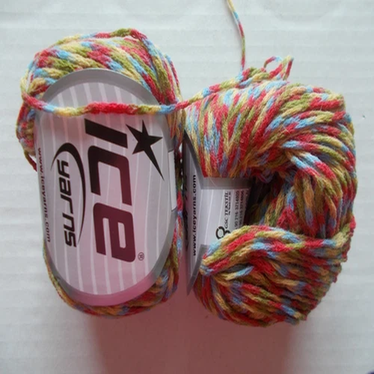 Ice Yarns Fireworks wool blend yarn, red/green/yellow/blue, lot of 2(126 yds ea)