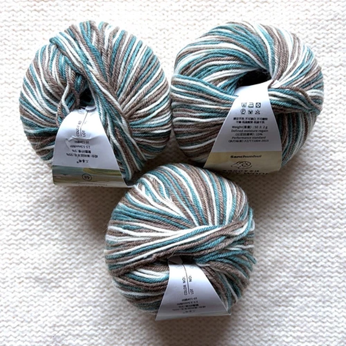 3 balls x 50g Fancy Wool Blend yarn : 95% Wool : Colour 07 Coastal Breeze