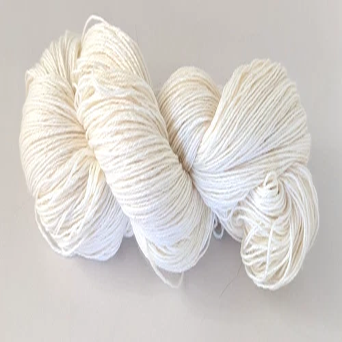 Artisan Spun SW Merino/ Cashmere/ Nylon Creamy Natural Iron Horse 4 oz/400 yds