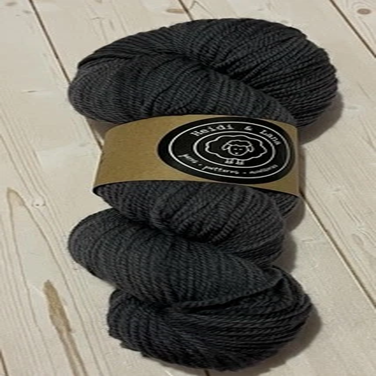 One new hank Heidi & Lana Homestead DK yarn Steel 100% Merino wool